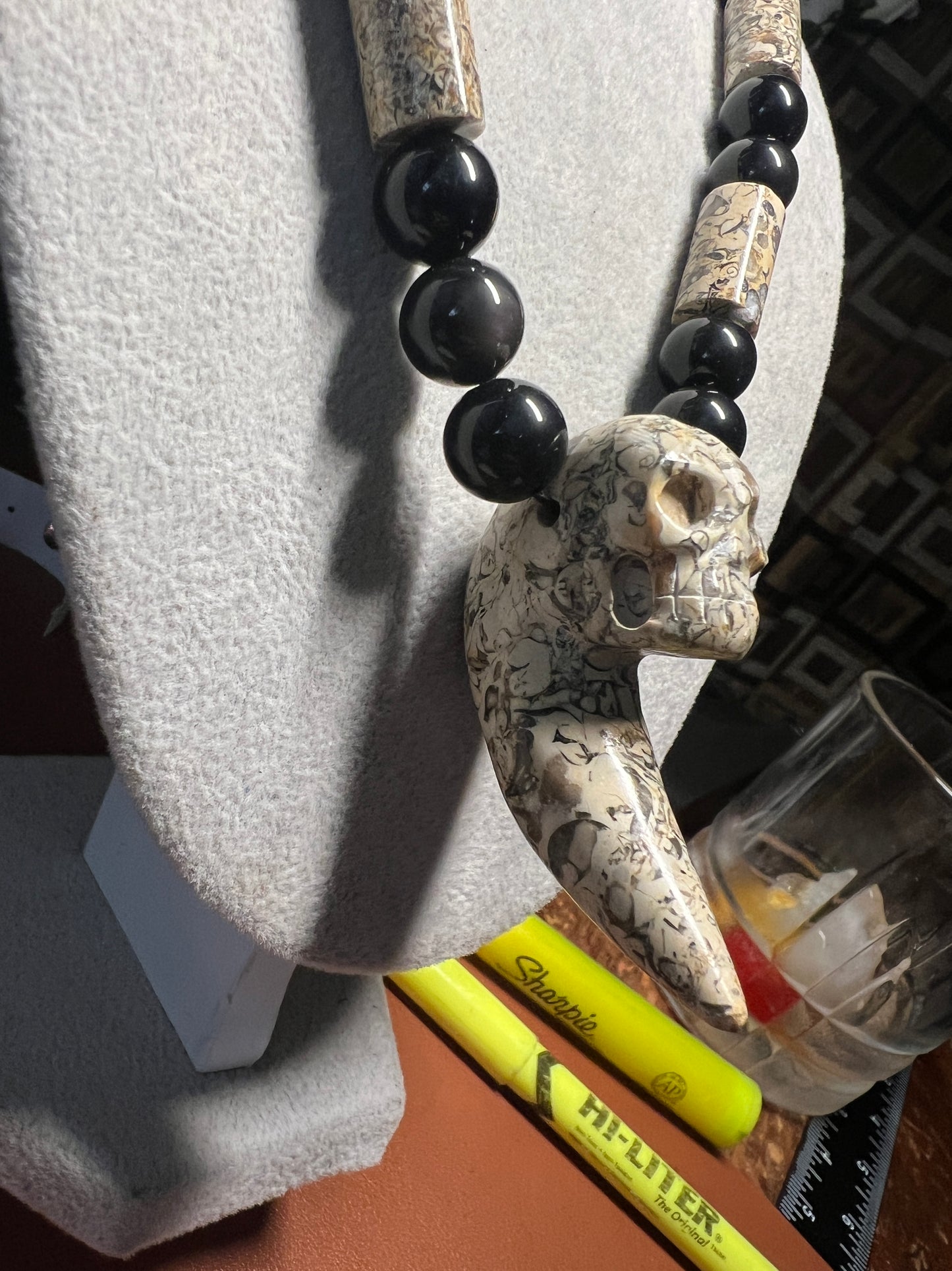 Black Rainbow obsidian and fossil stone tube necklace with a Mictlantecuhtli skull claw carving pendant #37