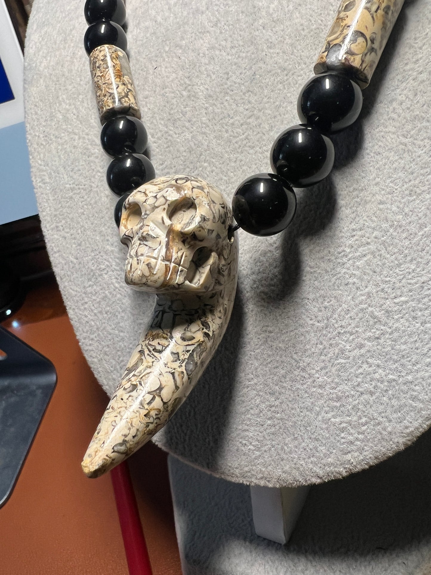 Black Rainbow obsidian and fossil stone tube necklace with a Mictlantecuhtli skull claw carving pendant #37