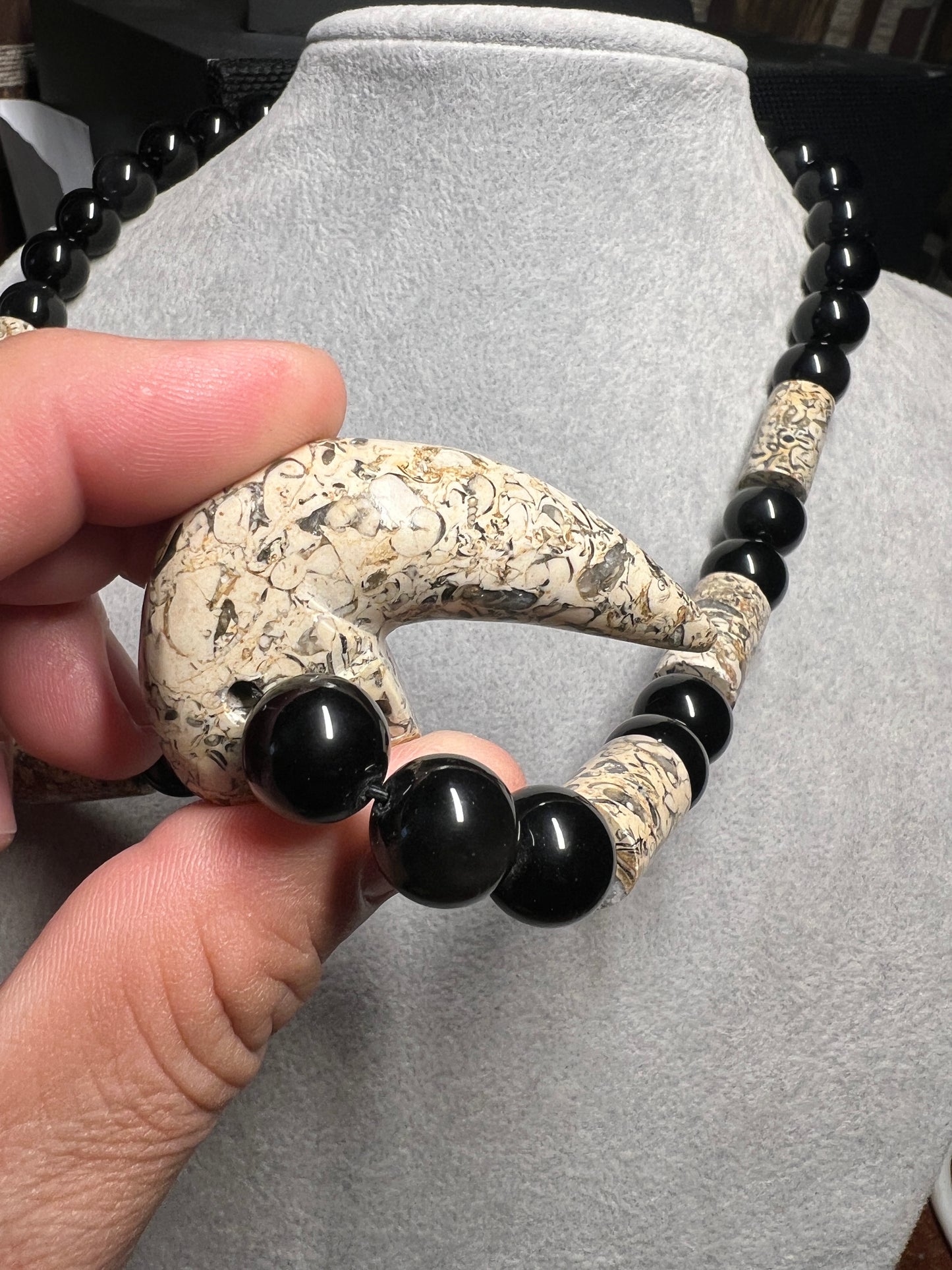 Black Rainbow obsidian and fossil stone tube necklace with a Mictlantecuhtli skull claw carving pendant #37