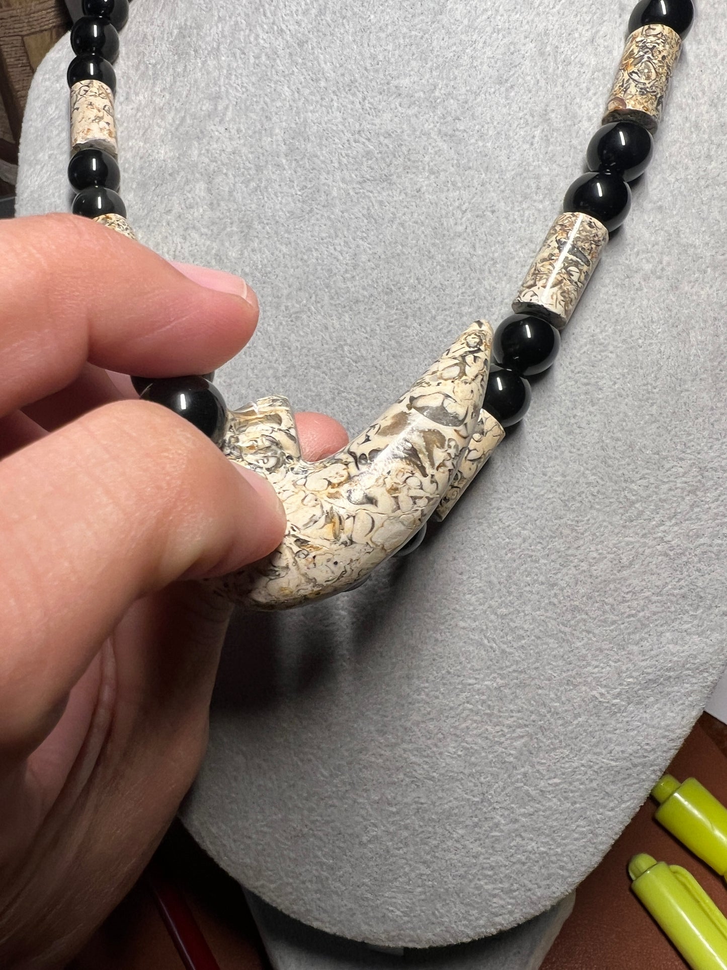 Black Rainbow obsidian and fossil stone tube necklace with a Mictlantecuhtli skull claw carving pendant #37