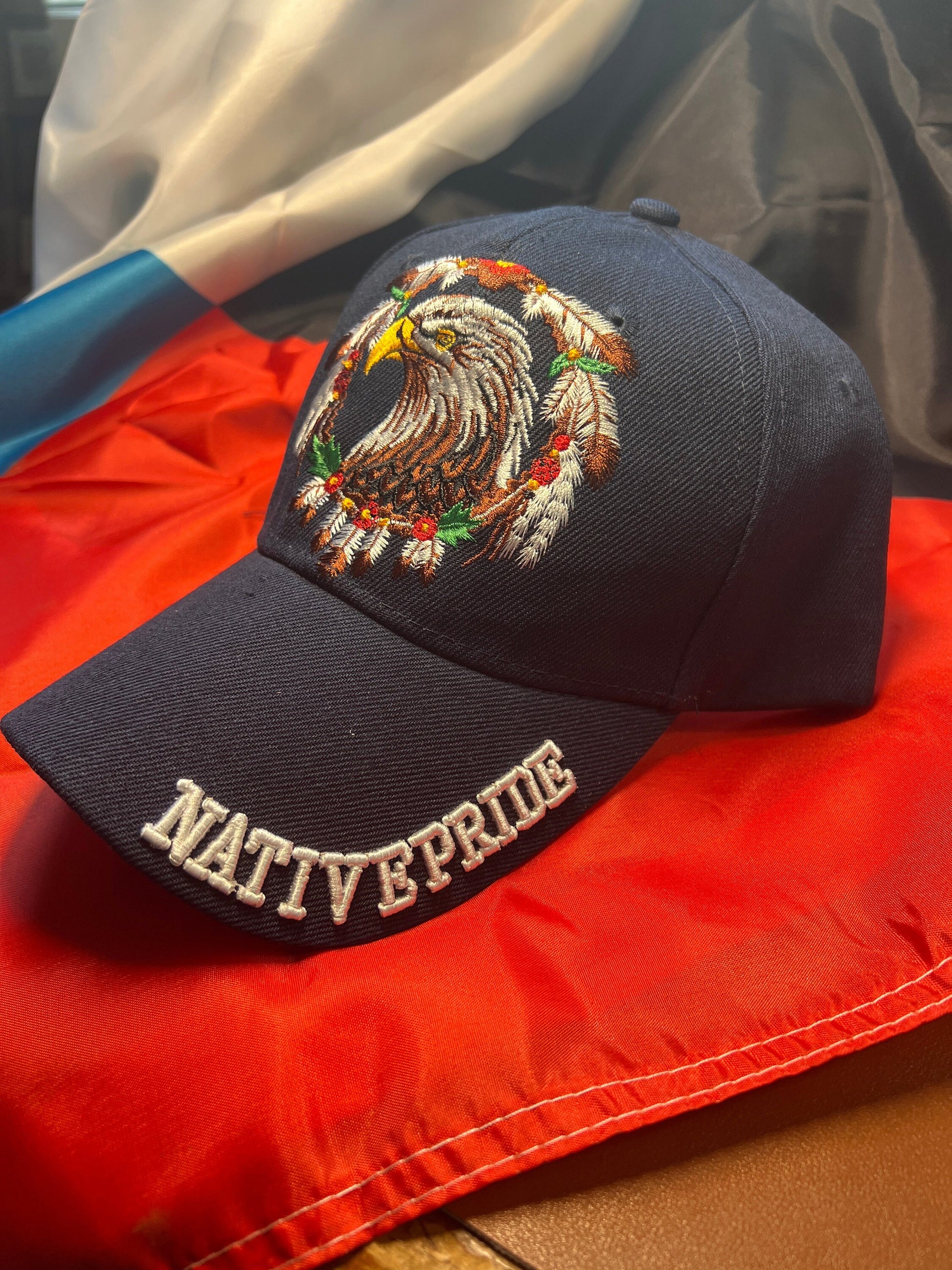 Native Pride Cap, Featuring the Eagle and Ring of Feathers, Navy Blue (One Size Fits Most) velcro adjustable strap