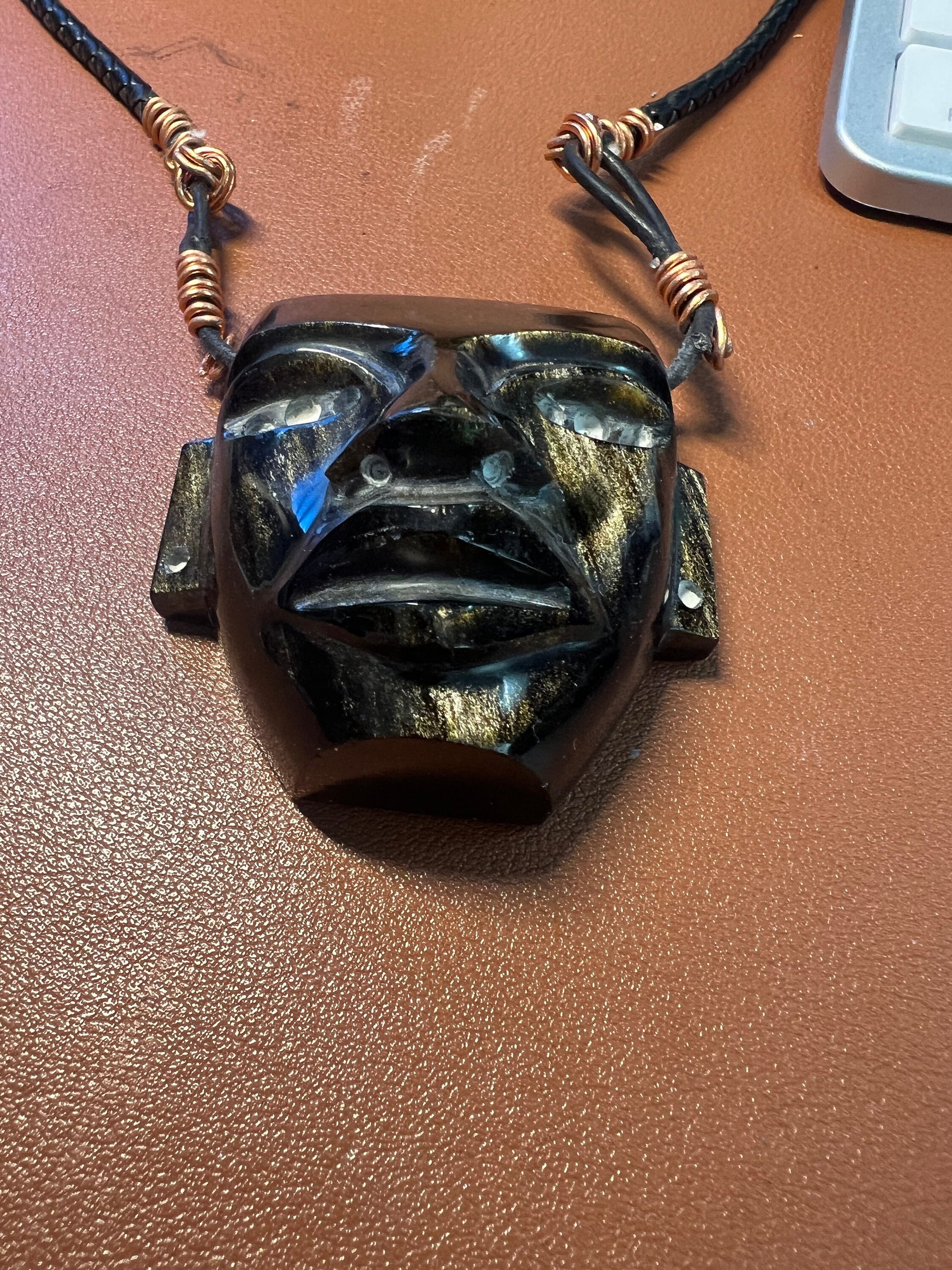 Black Gold Sheen Obsidian Mayan Mask Pendant Necklace with Braided Necklace and Copper Aluminum Bindings, (#A)