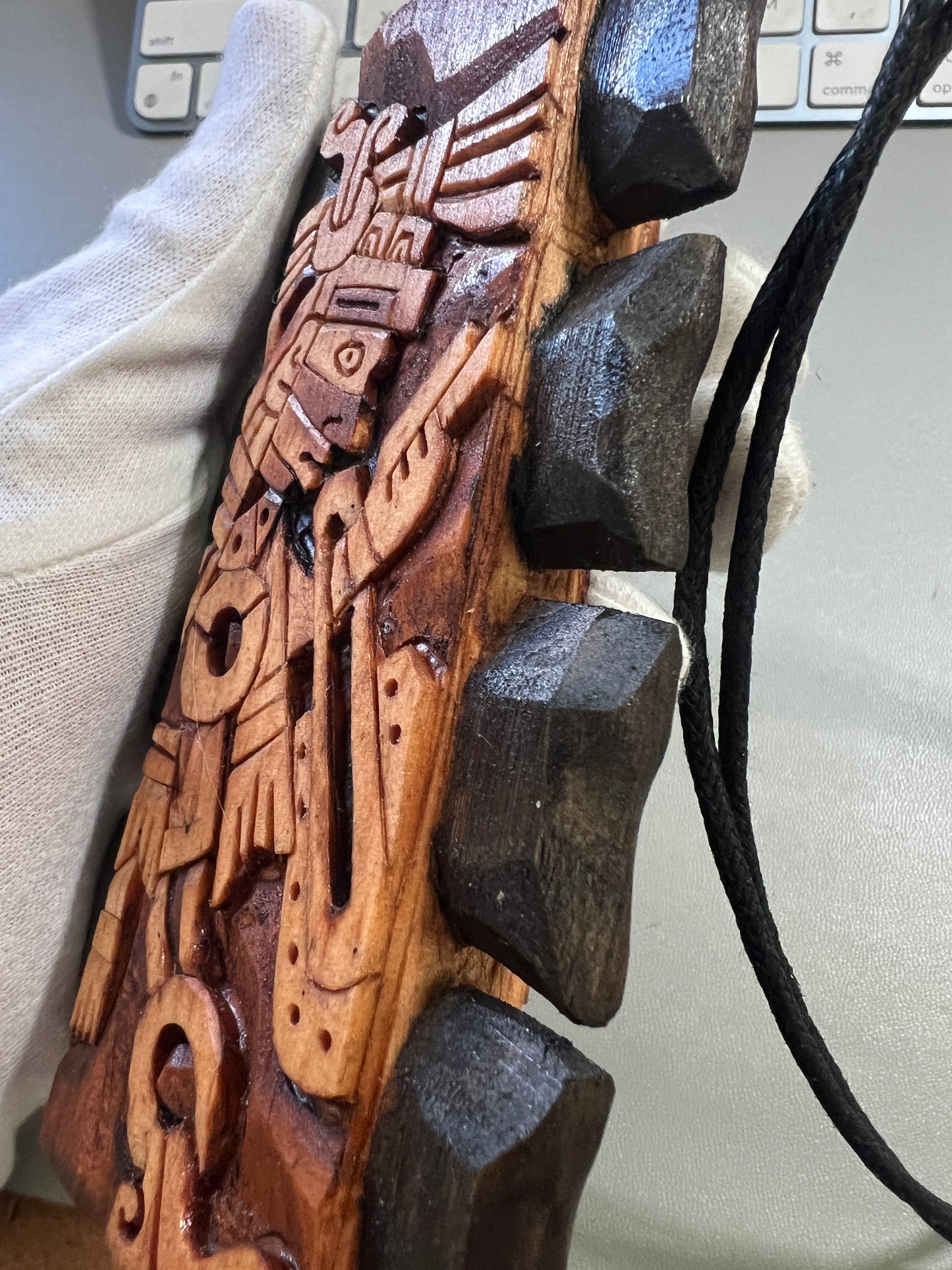 Mini Macuahuitl Azteca Necklace, feature Tezcatlipoca, the Smoking Mirror, Aztec God, Carved, Black Wood Blades, Hangable Art handmade 8in.