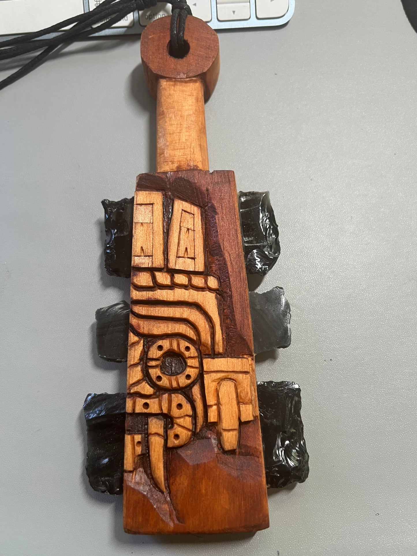 Mini Macuahuitl Azteca Necklace, feature Tlaloc Aztec Rain God, Carved Wood, 8", Black Obsidian Blades