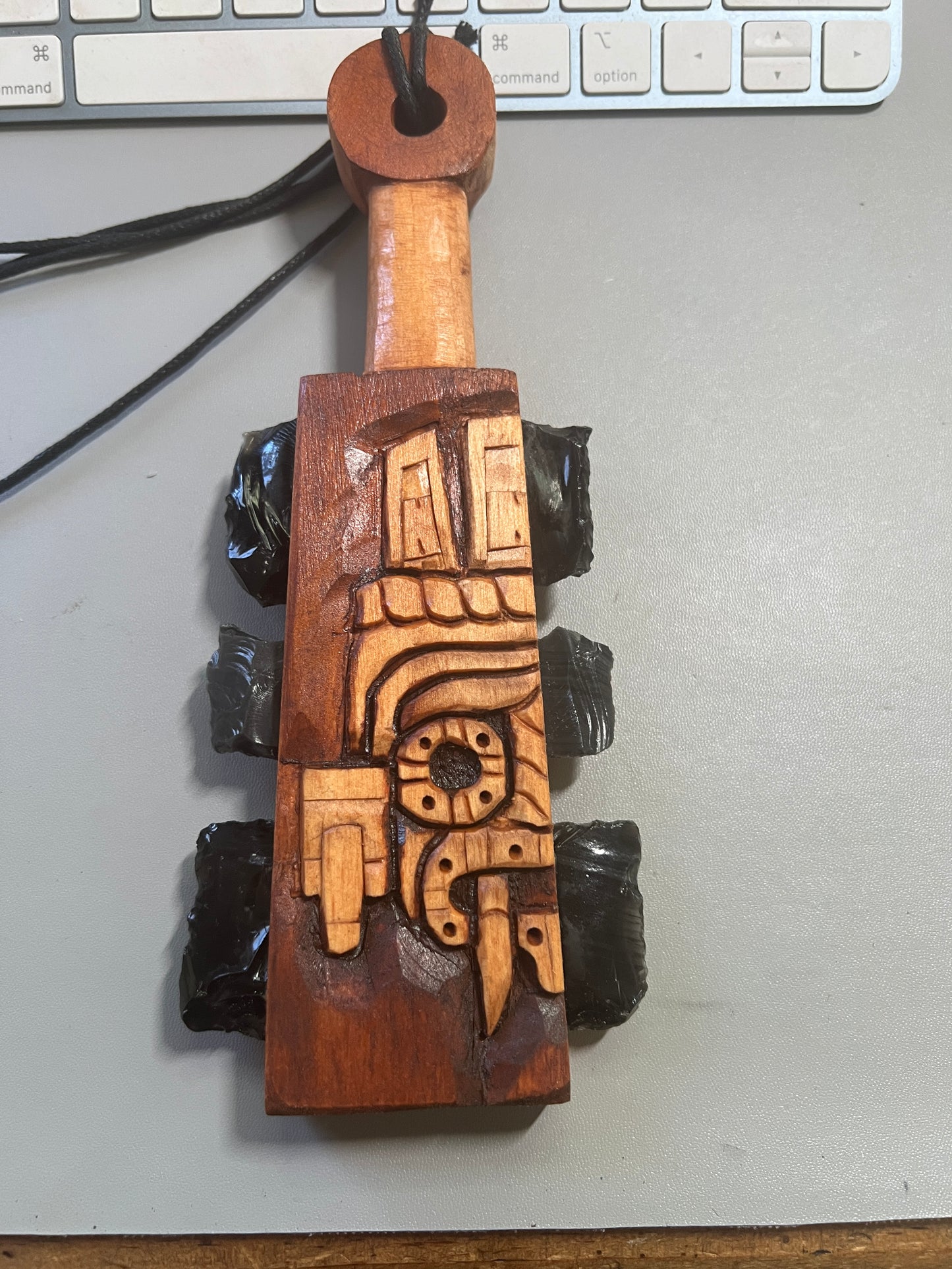 Mini Macuahuitl Azteca Necklace, feature Tlaloc Aztec Rain God, Carved Wood, 8", Black Obsidian Blades