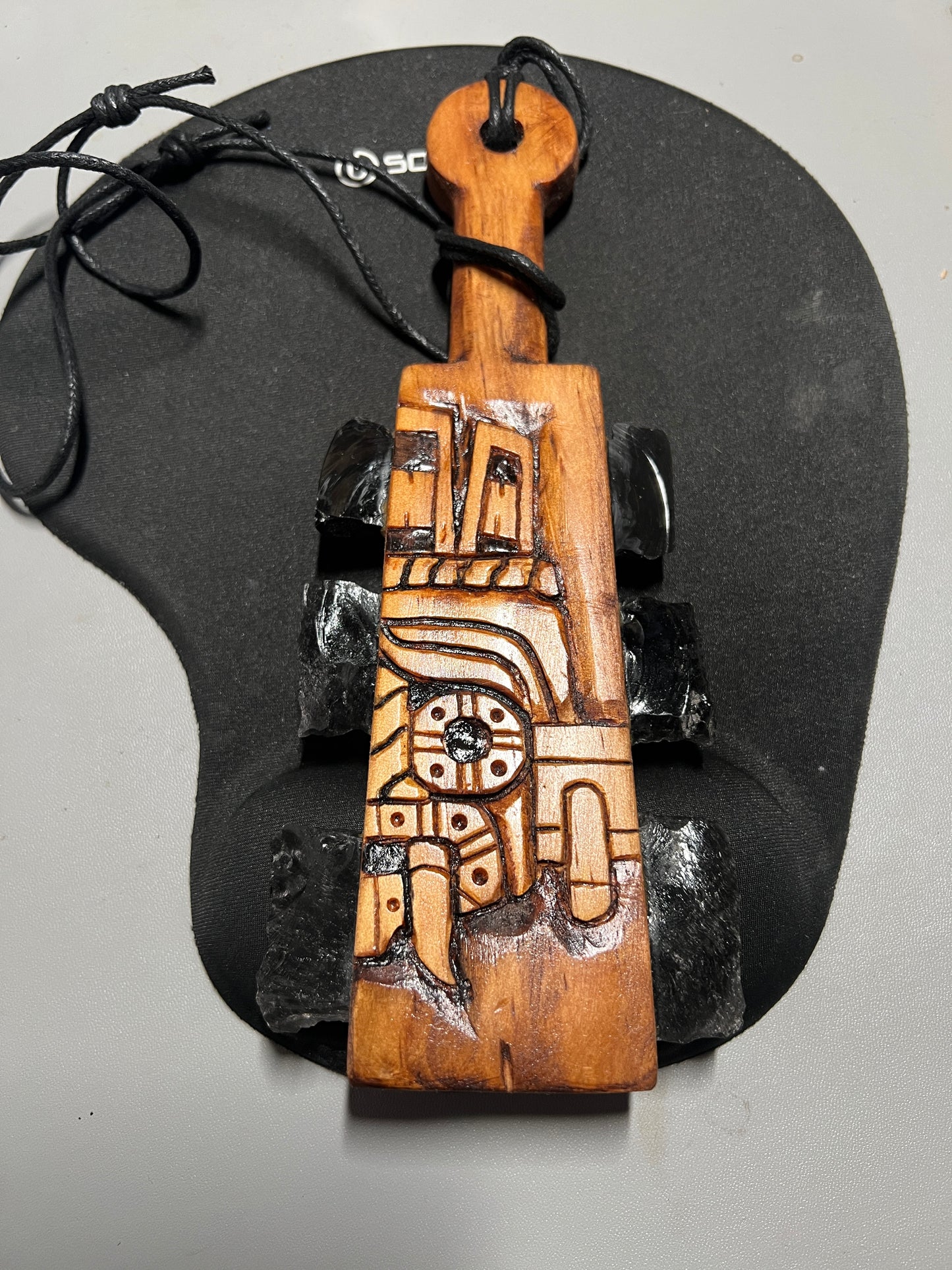 Mini Macuahuitl Azteca, Necklace, feature Tlaloc, Aztec Rain God, Carved Wood, 9", Black Obsidian Blades