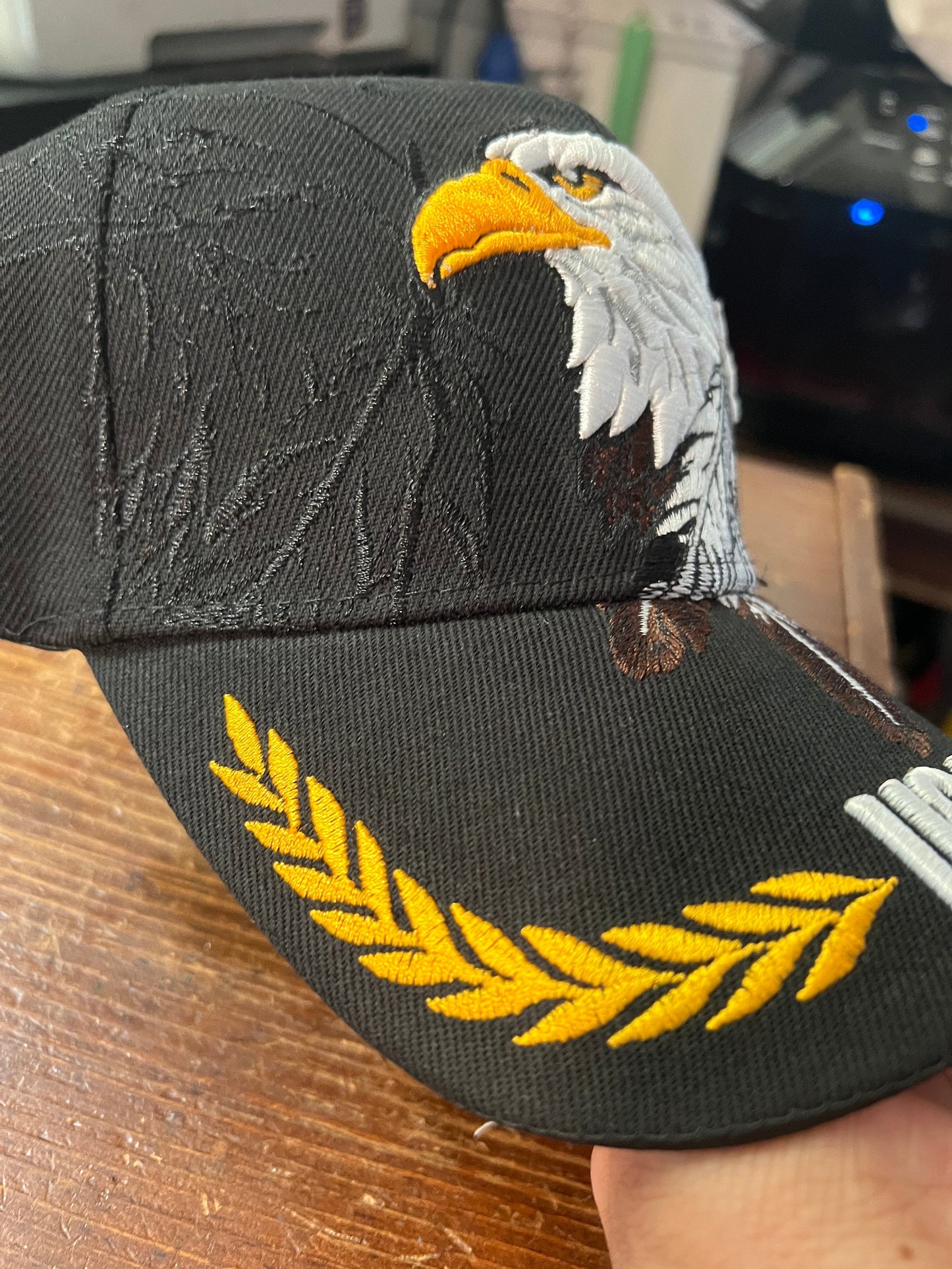 Native Pride Cap USA, Featuring Eagle and Two Feathers, Embroidered, Black, Aviation Gold Leaf (One Size Fits Most) velcro adjustable strap