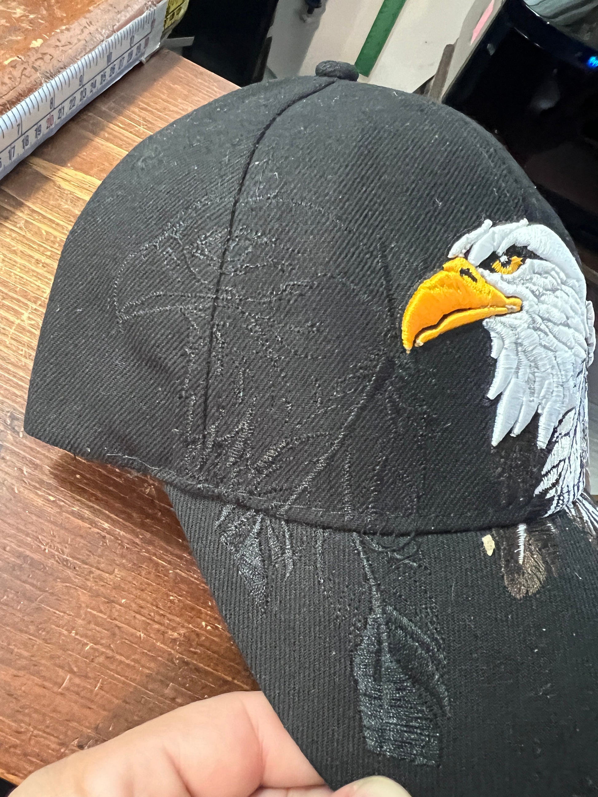 Native Pride Cap, Featuring the Eagle and Two Feathers, Embroidered, Black Silhouette, Black (One Size Fits Most) velcro adjustable strap