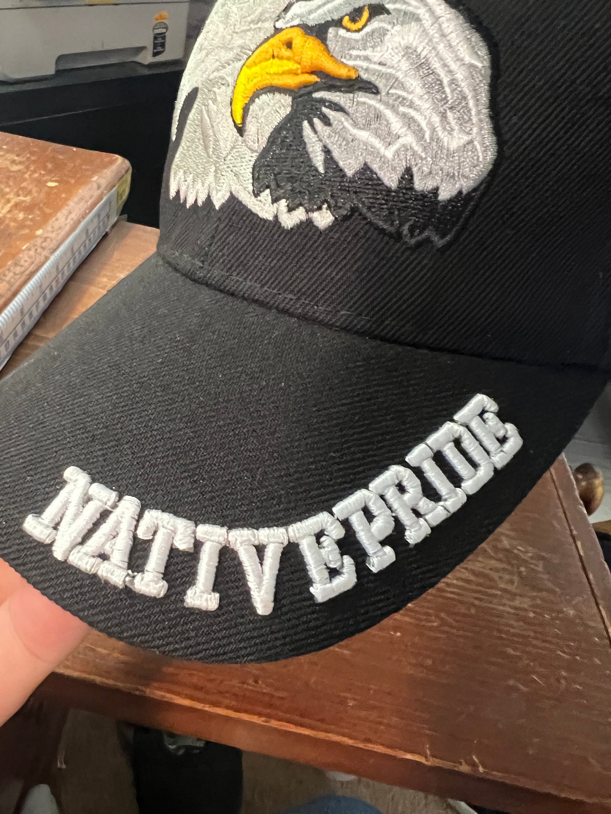 Native Pride Cap, Featuring Bald Eagle and Silver Silhouette, Embroidered, Black (One Size Fits Most) velcro adjustable strap